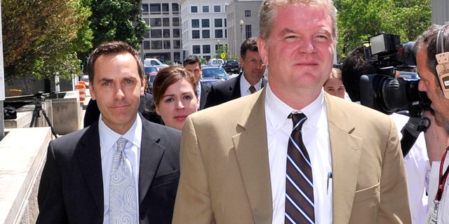 Victor Zaborsky, left, is seen here walking behind his attorney Thomas G. Connolly, center, as they left the courthouse on June 29, 2010, in Washington, D.C. All three of the defendants in the Robert Wone conspiracy trial were found not guilty by a District of Columbia Superior Court judge.