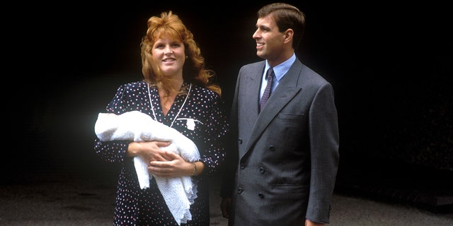 Prince Andrew, Duke of York, and Sarah, Duchess of York, leave Portland Hospital in London with their newborn daughter Princess Beatrice, circa 1988.