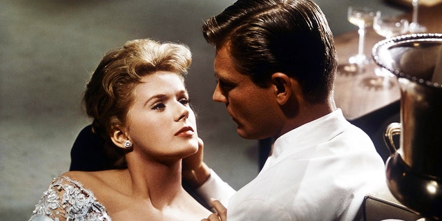Connie Stevens seduces Troy Donahue in a scene from the film "Susan Slade," 1961. 