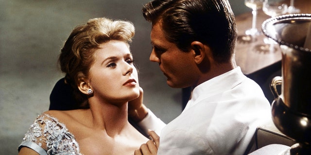 Connie Stevens seduces Troy Donahue in a scene from the film "Susan Slade," 1961.
