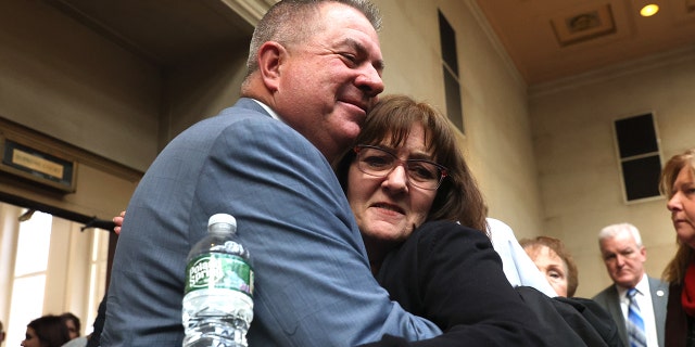 On Dec. 5, 2022, a homicide detective hugs Darlene Altman, whose mother, Diane Cusick, was killed by serial killer Richard Cottingham in 1968.