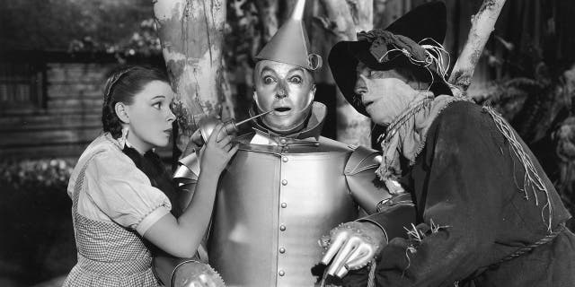 Jack Haley, middle, took over Buddy Ebsen's role as the Tin Woodman and became known as The Tin Man.