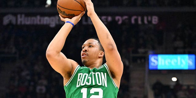 Grant Williams, #12 of the Boston Celtics, shoots during the second quarter against the Cleveland Cavaliers at Rocket Mortgage Fieldhouse on March 6, 2023 in Cleveland.