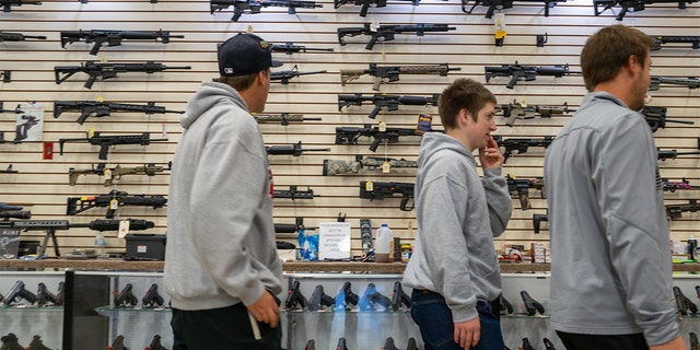 Guns are displayed in a store during the Rod of Iron Freedom Festival on Oct. 9, 2022, in Greeley, Pennsylvania.