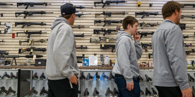 Guns are displayed in a store during the Rod of Iron Freedom Festival on Oct. 9, 2022, in Greeley, Pennsylvania.