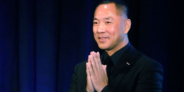 Guo Wengui (also known as Miles Kwok) holds a news conference with Steve Bannon in New York City on Nov. 20, 2018.