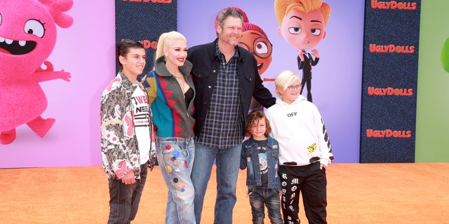 Gwen Stefani shares three children with her ex Gavin Rossdale.  Left to right: Kingston Rossdale, Gwen Stefani, Blake Shelton, Apollo Bowie Flynn Rossdale and Zuma Nesta Rock Rossdale.