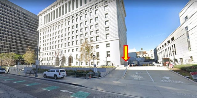 Image shows a pick-up/drop-off point for Los Angeles County District Attorney's Office employees using free transportation to and from their vehicles or public transportation. 