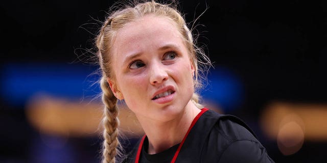 Hailey Van Lith of the Louisville Cardinals reacts during the Elite Eight round of the NCAA Women's Basketball Tournament against the Iowa Hawkeyes at Climate Pledge Arena on March 26, 2023, in Seattle, Washington.