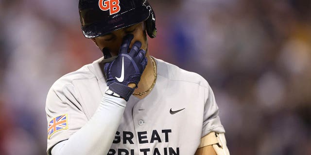 Harry Ford, #1 of Team Great Britain, reacts to a strike out against Team USA during the eighth inning of the World Baseball Classic Pool C game at Chase Field on March 11, 2023 in Phoenix.