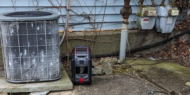 HazMat teams places air sampling devices throughout the neighborhood to monitor the plume of anhydrous ammonia.