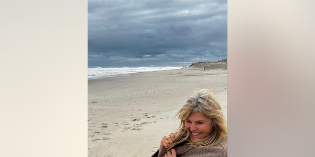 Christie Brinkley laughed in a photo that showed off her gray roots.