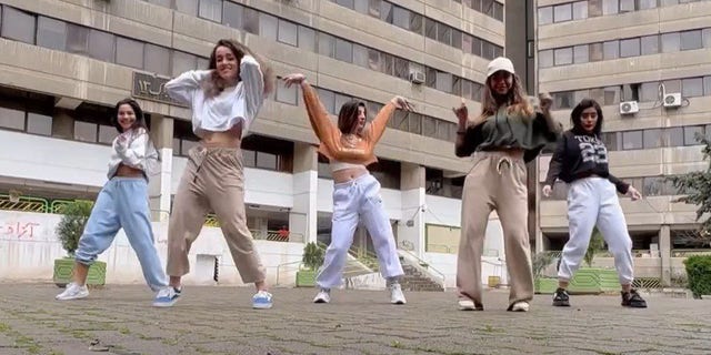 A still from a social media video of five Iranian teenage girls dancing to a Selena Gomez song. 