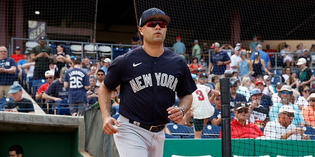 Isiah Kiner-Falefa of the New York Yankees is introduced before a spring training game against the Philadelphia Phillies at BayCare Ballpark on February 25, 2023 in Clearwater, Florida.