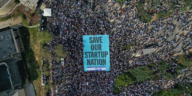 An aerial photograph showing protesters outside Israel's parliament on March 27. 