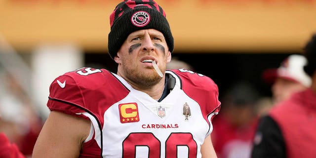Arizona Cardinals number 99 JJ Watt looks on during the player introduction before the start of the game against the San Francisco 49ers at Levi's Stadium on January 8, 2023 in Santa Clara, California.