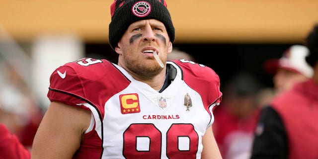 Arizona Cardinals number 99 JJ Watt looks on during the player introduction before the start of the game against the San Francisco 49ers at Levi's Stadium on January 8, 2023 in Santa Clara, California.