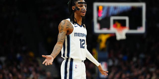 Memphis Grizzlies guard Ja Morant reacts to a foul during a Nuggets game at Ball Arena on March 3, 2023 in Denver.