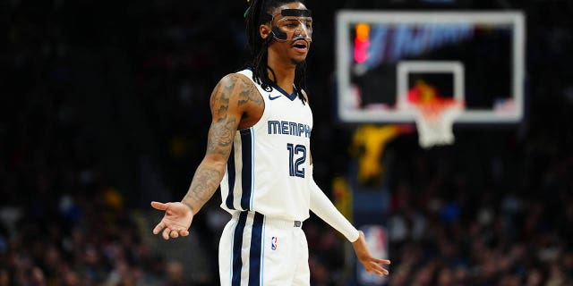 Memphis Grizzlies guard Ja Morant reacts to a foul during a Nuggets game at Ball Arena on March 3, 2023 in Denver.