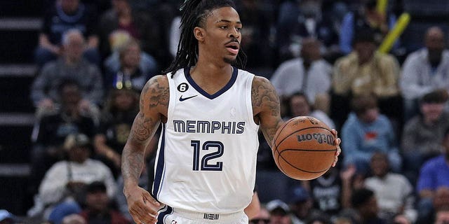 Ja Morant of the Memphis Grizzlies dribbles during the game against the New Orleans Pelicans at FedExForum in Memphis, Tennessee on December 31, 2022.