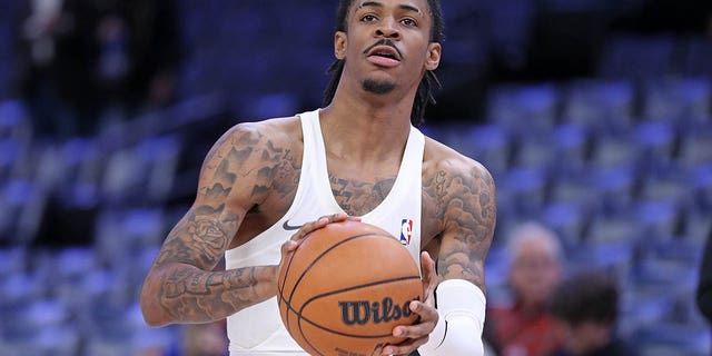 Ja Morant of the Grizzlies warms up before the game against the Chicago Bulls at FedExForum on Feb. 7, 2023, in Memphis, Tennessee.