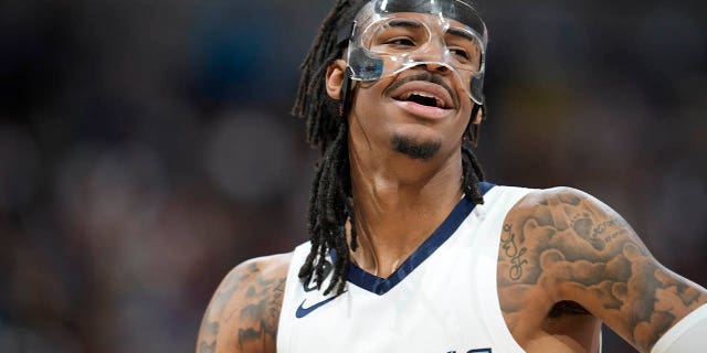 Memphis Grizzlies guard Ja Morant looks towards the dugout during the second half of the Nuggets game on Friday, March 3, 2023, in Denver.