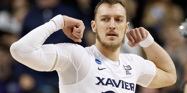 Jack Nunge #24 of the Xavier Musketeers reacts in the second half against the Pittsburgh Panthers during the second round of the NCAA Men's Basketball Tournament at Fieldhouse at Greensboro Coliseum on March 19, 2023 in Greensboro, North Carolina.
