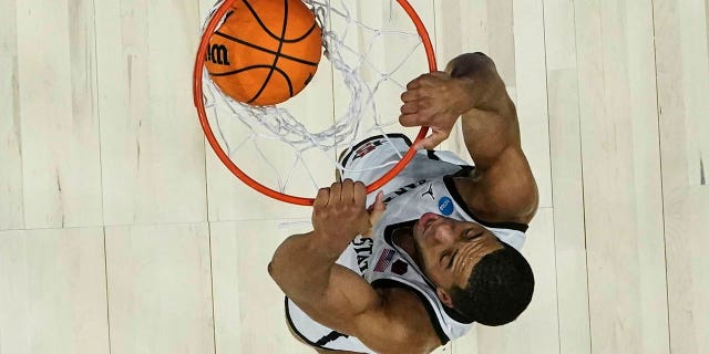 San Diego State forward Jaedon LeDee (13) dunks the ball against Creighton in the first half of a Elite 8 college basketball game in the South Regional of the NCAA Tournament, Sunday, March 26, 2023, in Louisville, Ky. (AP Photo/John Bazemore)