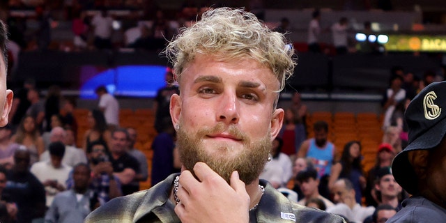 Jake Paul attends a game between the Cleveland Cavaliers and the Miami Heat at Miami-Dade Arena on March 8, 2023 in Miami, Florida.