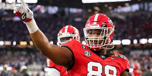 Georgia defensive lineman Jalen Carter, #88, waves to the crowd before the NCAA College Football Playoff game between Georgia and TCU on Monday, Jan. 9, 2023, in Inglewood, California.