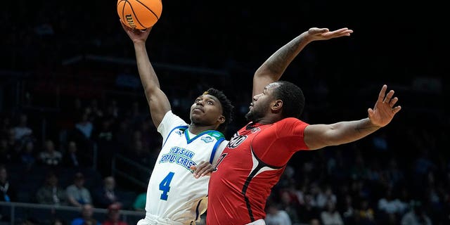 Texas A&amp;amp;M Corpus Christi's Jalen Jackson (4) shoots against Southeast Missouri State's Phillip Russell (1) during the first half of a First Four college basketball game in the NCAA men's basketball tournament, Tuesday, March 14, 2023, in Dayton, Ohio. 