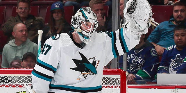 James Reimer, #47 of the San Jose Sharks, looks on from his crease during their NHL game against the Vancouver Canucks at Rogers Arena March 23, 2023 in Vancouver, British Columbia, Canada.