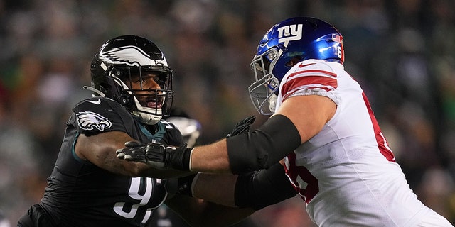 Javon Hargrave of the Eagles rushes the passer against Ben Bredeson of the New York Giants at Lincoln Financial Field on Jan. 8, 2023, in Philadelphia.