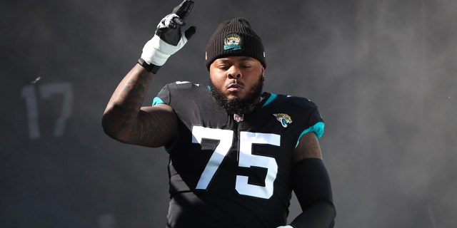 Jawaan Taylor #75 of the Jacksonville Jaguars takes the field before the game against the Dallas Cowboys at TIAA Bank Field on December 18, 2022 in Jacksonville, Florida.