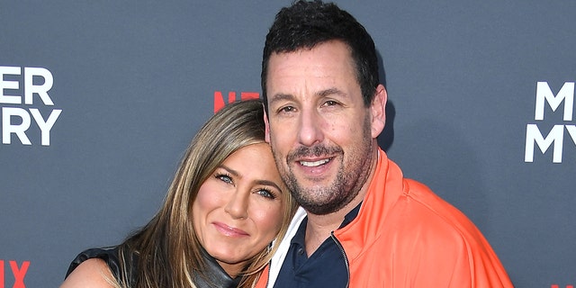 Sandler and Aniston became instant friends after they met as teenagers in a deli and bonded over how loud Aniston crunched while eating a pickle.