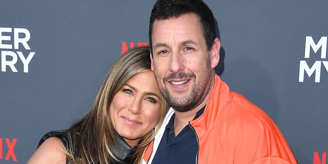 Sandler and Aniston became instant friends after they met as teenagers in a deli and bonded over how loud Aniston crunched while eating a pickle.