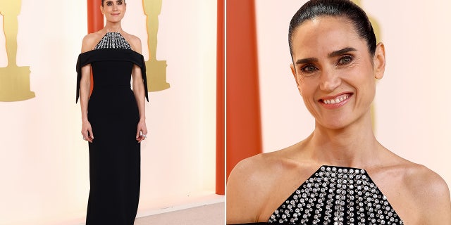 Jennifer Connelly added a touch of sparkle with a rhinestone collar on her Louis Vuitton dress. walks the red carpet as part of the cast for best picture nominated movie, "Top Gun: Maverick."