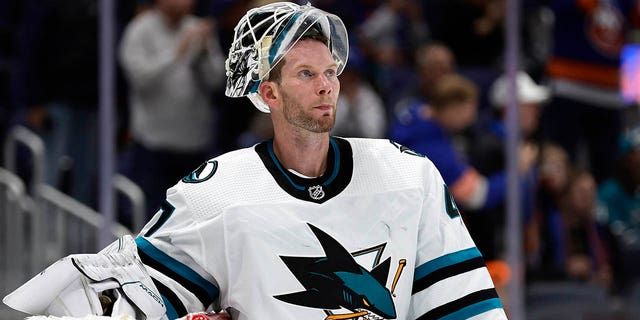 FILE - San Jose Sharks goalie James Reimer (47) reacts after conceding a goal against the New York Islanders in the second period of an NHL hockey game Tuesday, Oct. 18, 2022, in Elmont, NY. 