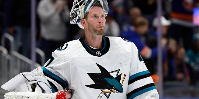FILE - San Jose Sharks goaltender James Reimer (47) reacts after giving up a goal against the New York Islanders in the second period of an NHL hockey game Tuesday, Oct. 18, 2022, in Elmont, N.Y.