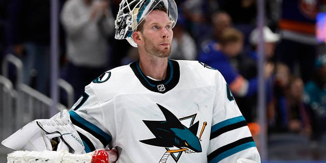 San Jose Sharks goaltender James Reimer reacts after giving up a goal against the Islanders, Oct. 18, 2022, in Elmont, New York.