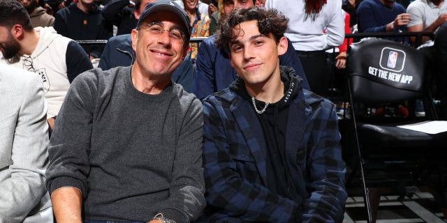Jerry Seinfeld and Julian Seinfeld attend a Brooklyn Nets game.