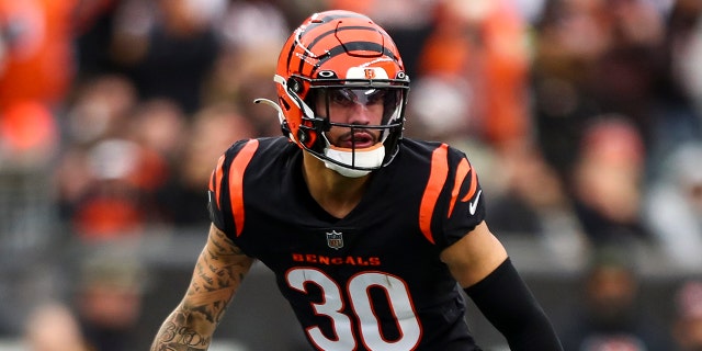 Jessie Bates III #30 of the Cincinnati Bengals falls into pass coverage during an NFL football game against the Cleveland Browns at Paycor Stadium on December 11, 2022 in Cincinnati, Ohio.