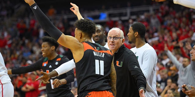 Miami Hurricanes head coach Jim Larranaga cheers on guard Jordan Miller, #11, against the Houston Cougars during the Sweet Sixteen round of the NCAA Men's Basketball Tournament 2023 Midwest Regionals held at T-Mobile Center on March 24, 2023 in Kansas City, Missouri. 