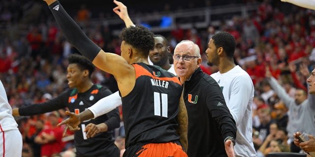 Miami Hurricanes head coach Jim Larranaga cheers on guard Jordan Miller, #11, against the Houston Cougars during the Sweet Sixteen round of the NCAA Men's Basketball Tournament 2023 Midwest Regionals held at T-Mobile Center on March 24, 2023 in Kansas City, Missouri. 