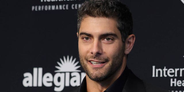 Quarterback Jimmy Garoppolo is introduced at the Las Vegas Raiders Headquarters/Intermountain Health Care Performance Center on March 17, 2023 in Henderson, Nevada.