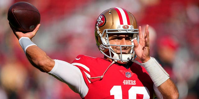 Jimmy Garoppolo, #10 of the San Francisco 49ers, warms up prior to the game against the New Orleans Saints at Levi's Stadium on Nov. 27, 2022 in Santa Clara, California.