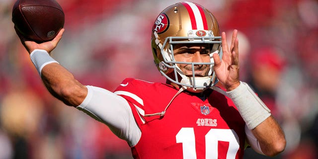 Jimmy Garoppolo, number 10 of the San Francisco 49ers, warms up before the game against the New Orleans Saints at Levi's Stadium on November 27, 2022 in Santa Clara, California.