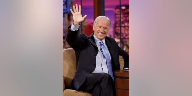 President Joe Biden waving to the audience during an interview. Biden tells an 'epiphany' story which stirred some controversy on the Daily Show in New York City, New York.