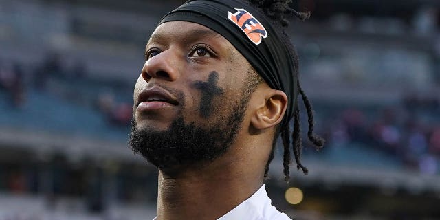 Joe Mixon, #28 of the Cincinnati Bengals, walks off the field after defeating the Baltimore Ravens 27-16 at Paycor Stadium on Jan. 8, 2023 in Cincinnati.