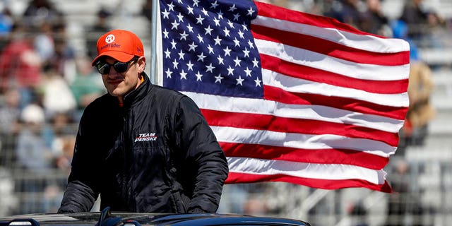 NASCAR Cup Series driver Joey Logano rides to pit road before the start of the Ambetter Health 400 auto race at Atlanta Motor Speedway, Sunday, March 19, 2023, in Hampton, Ga.